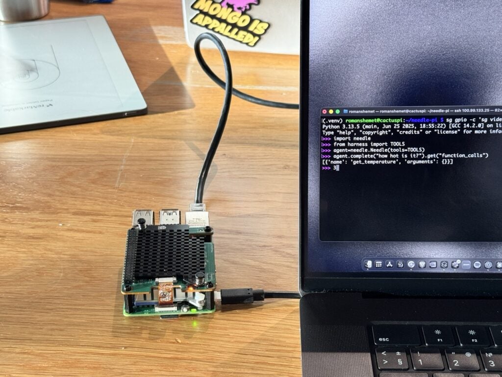 A Raspberry Pi 5 on a desk connected to a laptop; the laptop's terminal shows a tool-call session resolving 'how hot is it?' into a get_temperature call.
